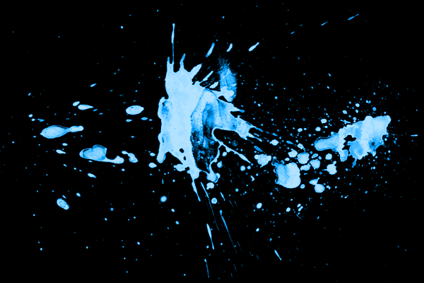 Splatter brush used as paint in UV light