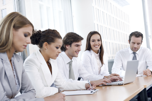 Business people sitting together in meeting Business people sitting together in meeting