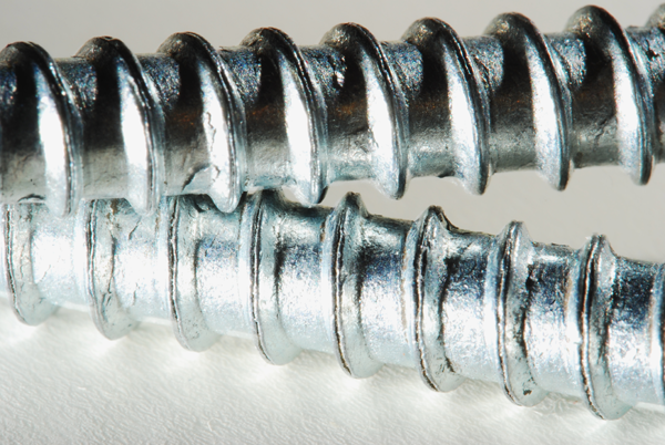 Close up of two screw’s rifle on white background Close up of two screw’s rifle on white background